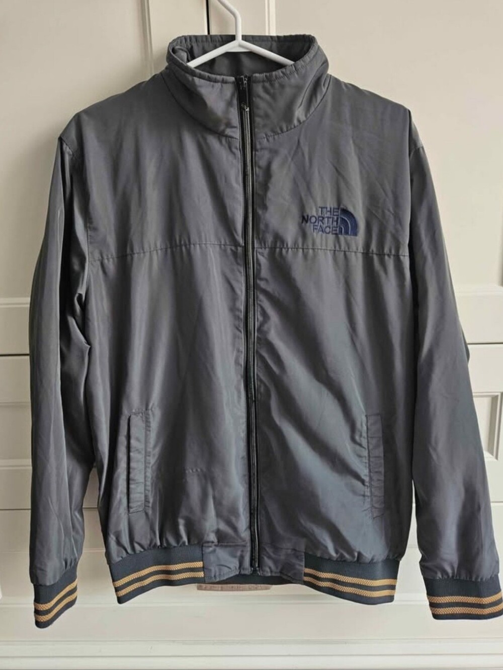 The North Face Men's Gray Bomber Jacket with Navy Logo